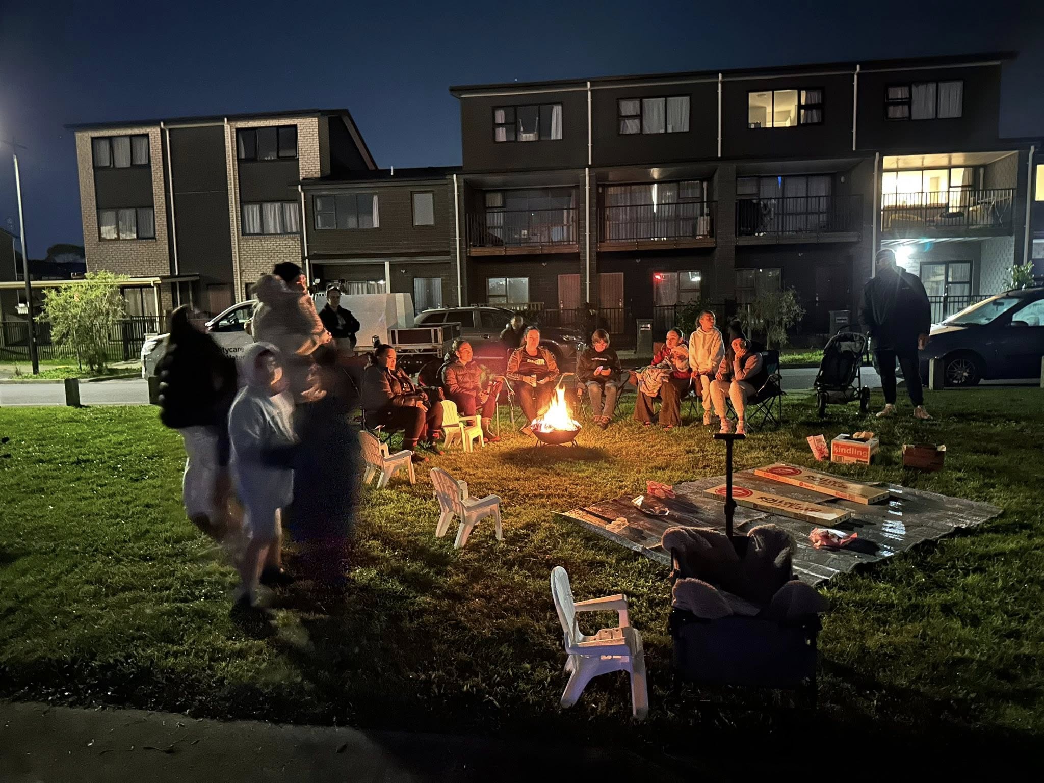 Residents gathered around a fire for Matariki